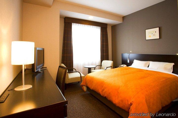 Jr-East Hotel Mets Тачикава Номер фото